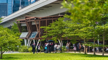 The viewing pavilion offers an elevated platform for enjoying views of the park and the sea beyond.